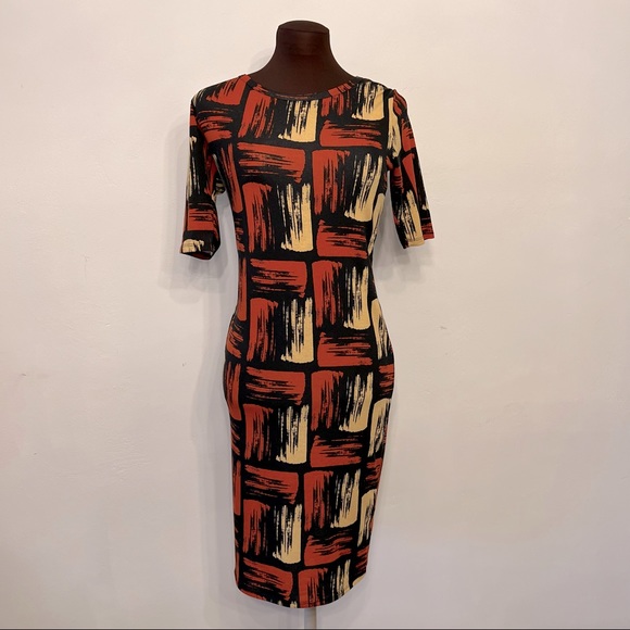LuLaRoe Dresses & Skirts - LuLaRoe Julia 363 Black with Yellow & Red Print, XS, EUC